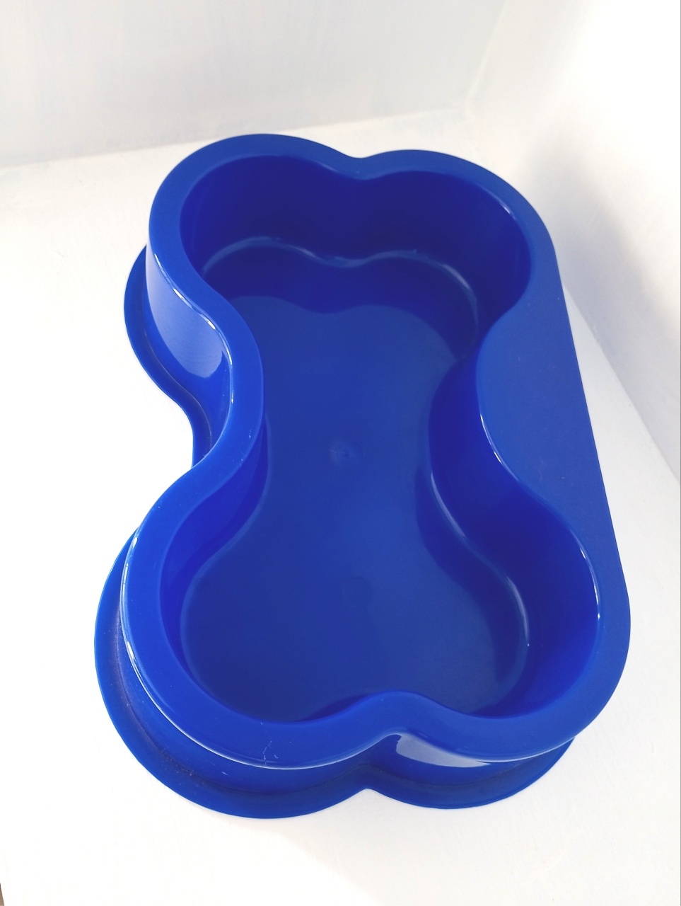 Peça de Doce Azul Formato Osso Funda -  Jenaina Decoração e Locação 
