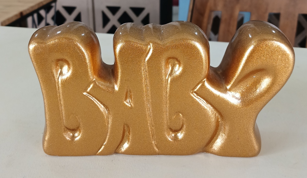 Baby Cerâmico Dourado - BEMDEFESTA