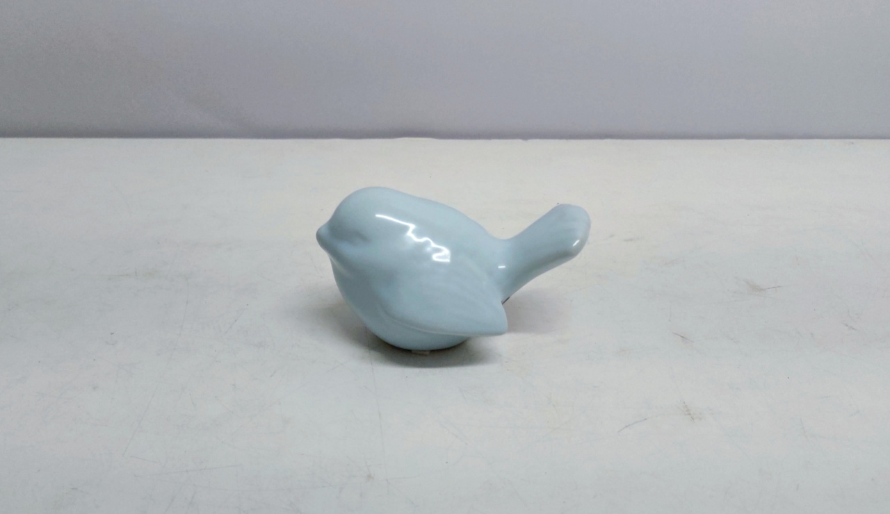Passáro Louça Azul Claro 7Cm Alt X 7Cm Larg X 12 Cm Comp - BB Festas Aluguel 