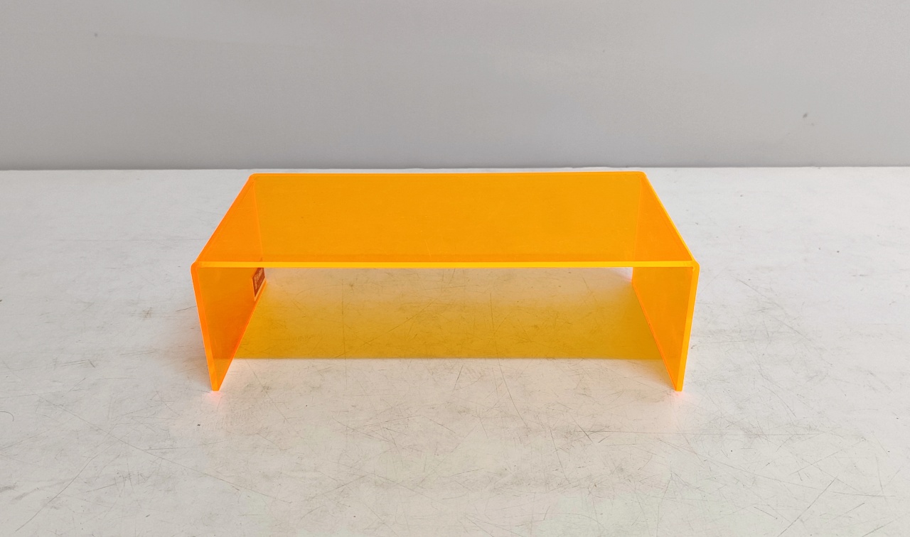 Suporte Acrílico Laranja Neon/M 8Cm Alt X 26Cm Larg X 13Cm Comp  - BB Festas Aluguel 