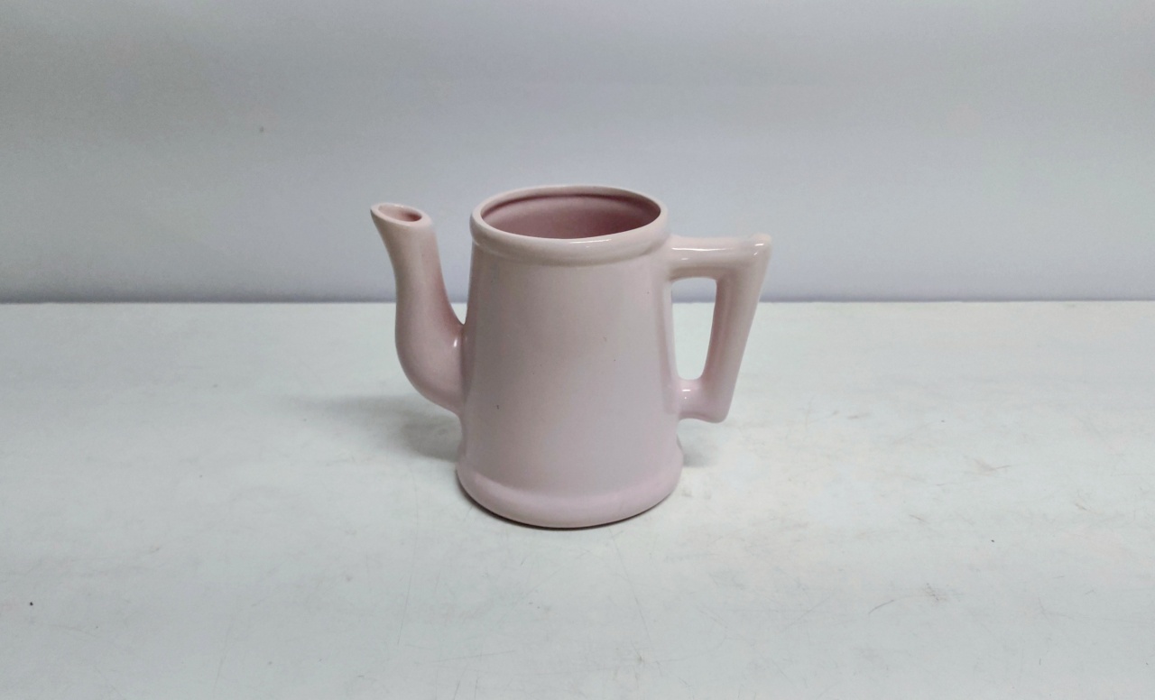 Vaso Chaleira Rosa Claro 14Cm Alt X 12Cm Larg X 19Cm Comp - BB Festas Aluguel 