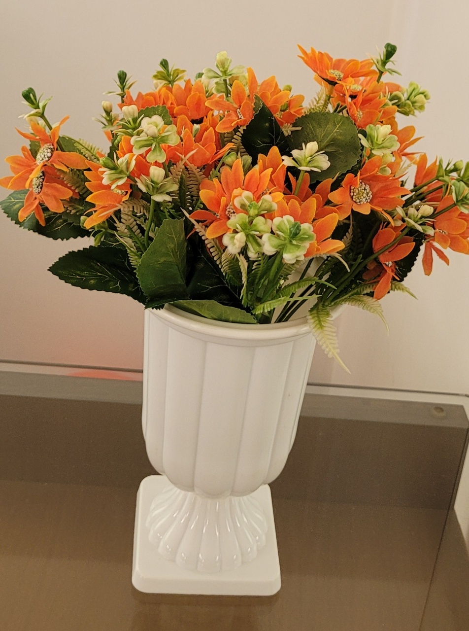 Arranjo Margaridas Laranja - lucia mendonça decoraçoes
