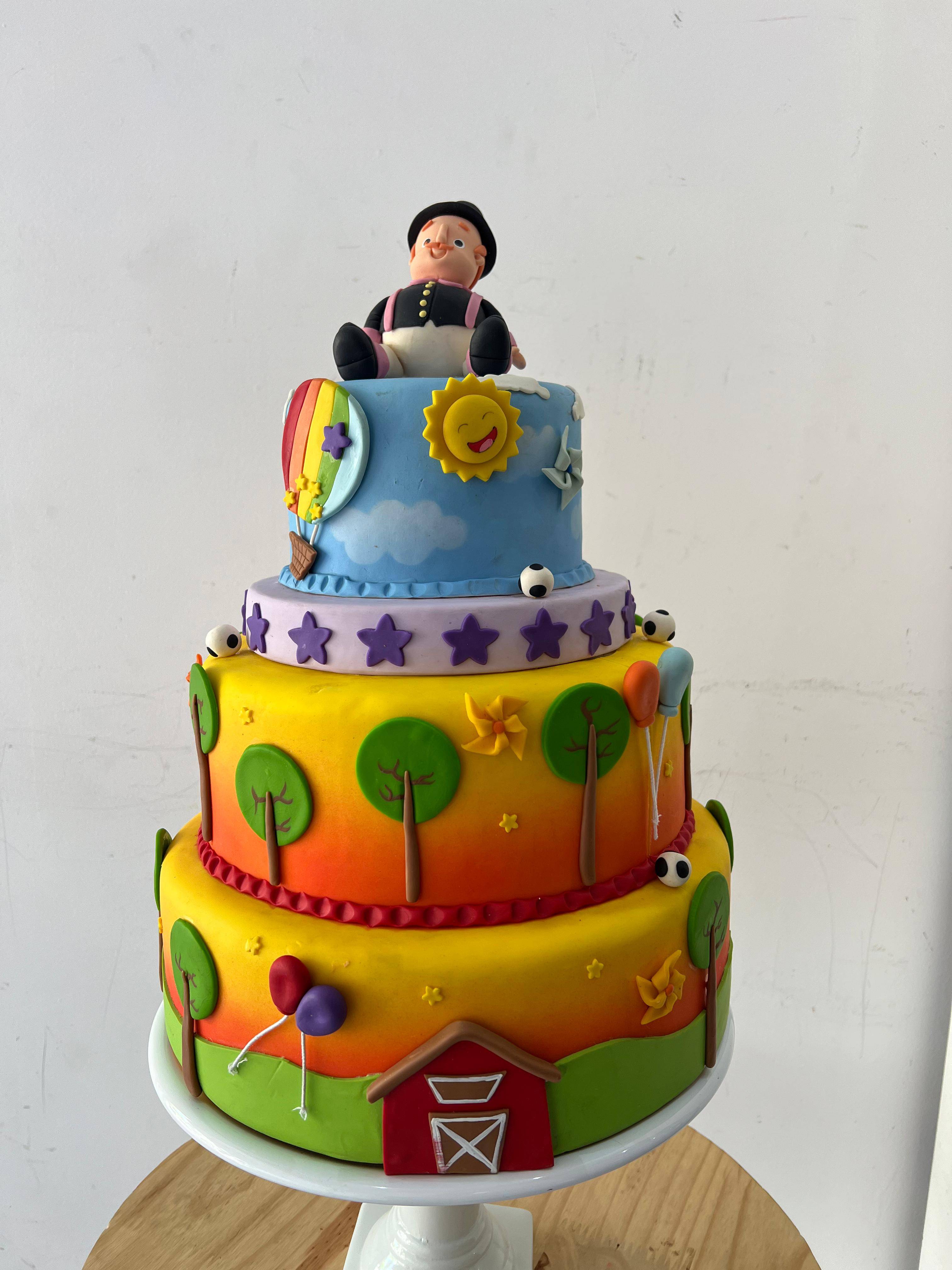 Bolo Fake Mundo Bita   Biscuit - Boutique festa locações 